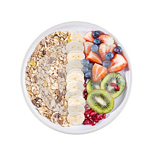 Delicious healthy breakfast of fruit salad with oat muesli. Dietary breakfast