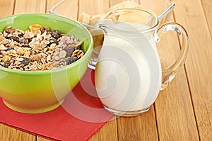 Delicious and healthy cereal in bowl with milk