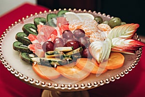 Delicious healthy fruit plate at wedding reception in luxury res