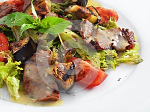 Delicious healthy warm salad with beef and vegetables