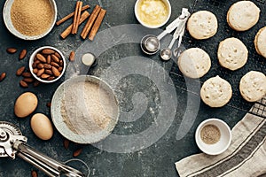 Delicious homemade almond cookies and baking ingredients.