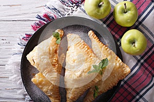 Delicious homemade apple pie turnover closeup. horizontal top vi