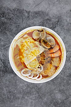 Delicious homemade curry noodles  mee kari  serve with seafood and egg