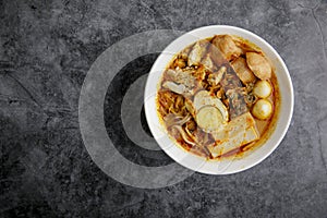 Delicious homemade curry noodles  mee kari  serve with seafood and egg