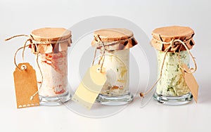Delicious homemade dips in jars with tags
