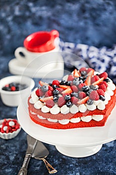 Delicious homemade heart shaped red velvet cake decorated