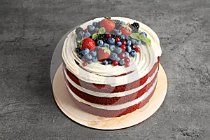 Delicious homemade red velvet cake with fresh berries