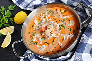 Delicious hot bisque in metal casserole