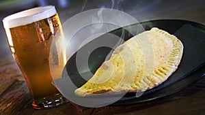 Delicious hot pie with beer photo