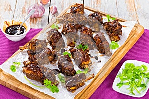 Delicious hot sticky ribs seasoned with barbecue sauce