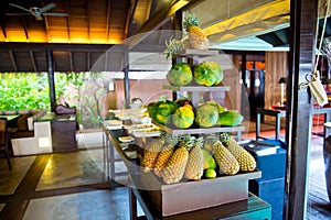 Delicious hotel restaurant allinclusive buffet with tasty food. Fruit papaya, pineapple photo