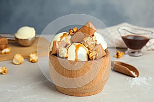 Delicious ice cream with caramel and popcorn served