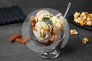 Delicious ice cream with caramel and sauce served