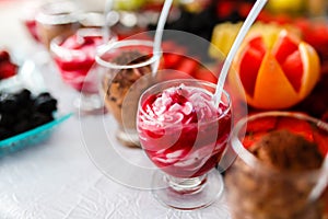 Delicious Ice Cream Sundae decorated with fruits