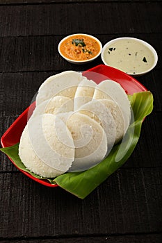 Delicious Idly served with sambar in banana leaf