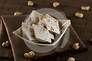 Delicious Indian Sweet Kaju Katli in a White Bowl