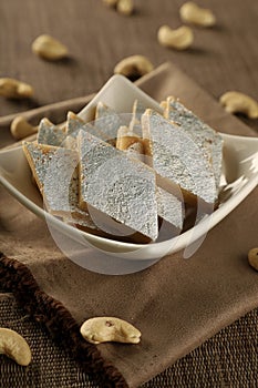 Delicious Indian Sweet Kaju Katli in a White Bowl