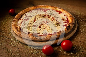 Delicious italian pizza served on wooden table