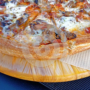 delicious Italian pizza top view scorch close up