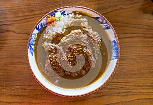 Delicious japanese burger curry rice bowl