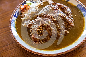 Delicious japanese burger curry rice bowl