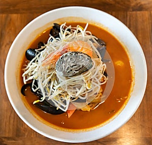 Delicious jjamppong, jjambbong, Chinese-style Korean noodle soup topped with spicy seafood and kimchi broth in South Korea