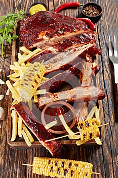 Pork ribs with french fries and sauce
