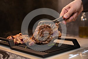 Delicious juicy meat steak cooking on grill. Aged prime rare roast grilling tenderloin fresh marble tenderness beef