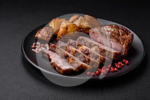 Delicious juicy pork or beef steak grilled with salt, spices and herbs