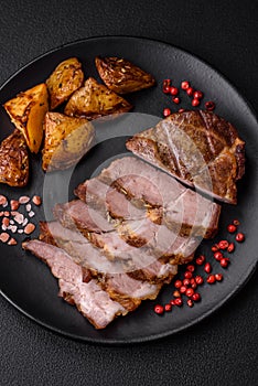 Delicious juicy pork or beef steak grilled with salt, spices and herbs