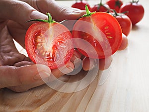 Delicious juicy red tomatoes. Tomato cut in half.