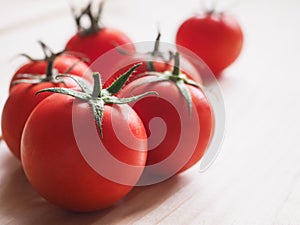 Delicious juicy red tomatoes. Tomato cut in half.