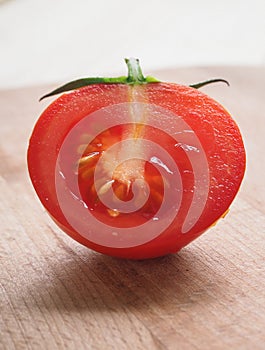 Delicious juicy red tomatoes. Tomato cut in half.