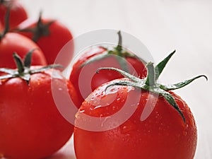 Delicious juicy red tomatoes. Tomato cut in half.