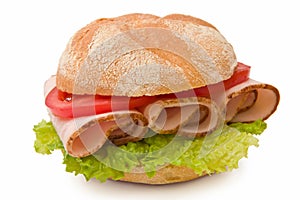Delicious kaiser roll with turkey breast, lettuce photo