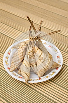 Delicious Ketupat Daun Palas ready to eat on Eid Festival