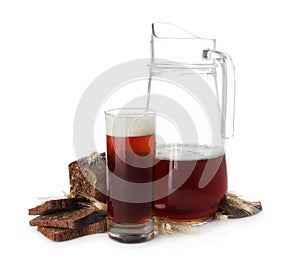 Delicious kvass, bread and spikes on background