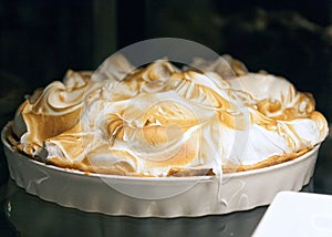 Delicious lemon meringue pie in white bowl