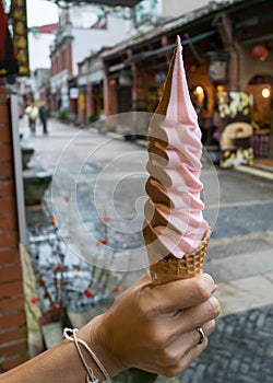 The delicious long Ice-cream cone (mixed strawberry and chocolate flavor) at food street market