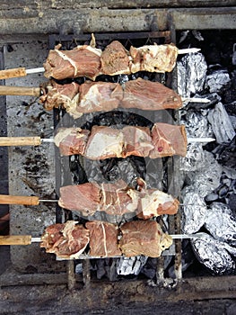 Delicious looking mutton and beef on BBQ.