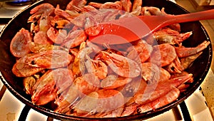 Shrimps fried on a pan