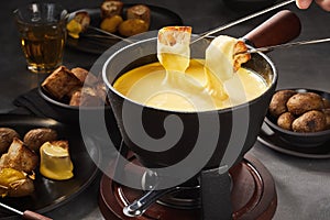 Delicious melted cheese fondue with dipping forks