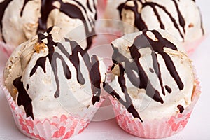 Delicious meringue cakes with chocolate.