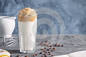 Delicious milk drink with coffee foam. Dalgone coffee. Photo with place for text