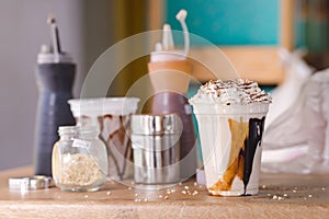 Delicious milkshake on table