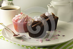 Delicious Mothers day chocolate cupcakes. Sweet dessert. Birthday, party food. Bright background. Food photo