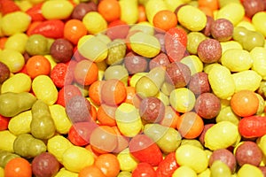 Delicious multi-colored fruit marmalade. unhealthy bright candies in bulk. different jelly photo close. tasty sweets in the candy