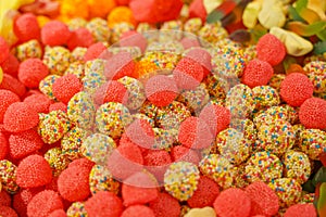 Delicious multi-colored fruit marmalade. unhealthy bright candies in bulk. different jelly photo close. tasty sweets in the candy