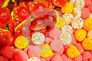 Delicious multi-colored fruit marmalade. unhealthy bright candies in bulk. different jelly photo close. tasty sweets in the candy