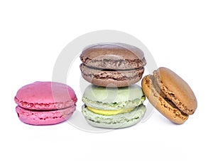 Delicious multicolored macaroons, isolated on white background